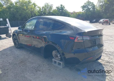 2023 Tesla Model Y Awd/Long Range Dual Motor All-Wheel Drive z USA, uszkodzony, nr VIN 7SAYGDEE8PA055902